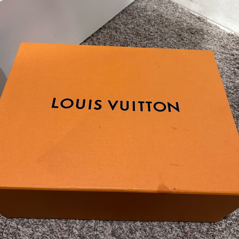 White Louis Vuitton size 10 high tops.